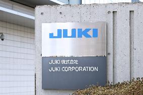 JUKI signboard and logo